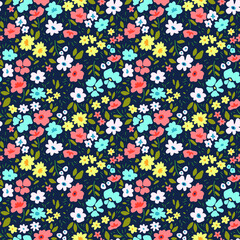 Vintage floral background. Seamless vector pattern for design and fashion prints. Flowers pattern with small colorful flowers on a dark blue  background. Ditsy style.
