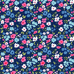 Fototapeta na wymiar Vintage floral background. Seamless vector pattern for design and fashion prints. Flowers pattern with small blue, pink and white flowers on a dark blue background. Ditsy style.