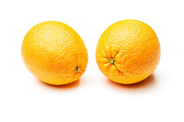Two ripe oranges on a white background. Isolate Yellow orange.