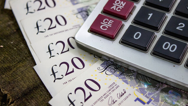 English pounds and calculator close up