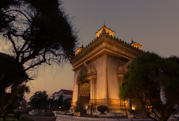 Patuxai Gate of Triumph in Night Light, Vientiane, Laos, Patuxai is a war monument in the center of...