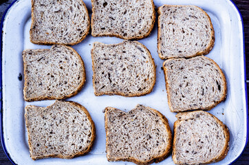 Chopped homemade bread food on table.