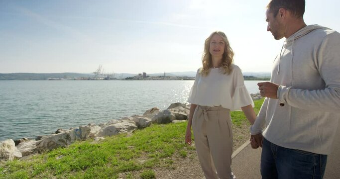 4K Slow Motion Of Couple Enjoying Beautiful View Of Sea On Sunny Spring Day