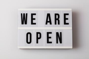 light box with text we are open