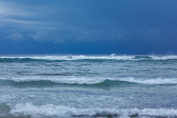 Naklejka na ściany i meble dramatic sky over a sea with waves, stormy sea waves