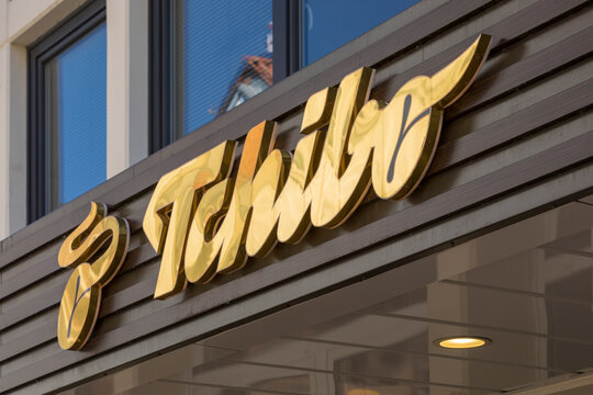 Stade, Germany - May 28, 2020: Signage above entrance of Tchibo store. Tchibo is a German chain of coffee retailers and caf&eacute;s known for its range of non-coffee products that change weekly.