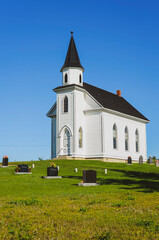 Fototapeta na wymiar a beautiful old church on a hill in Stonehaven, New Brunswick, Canada