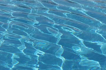 Turquoise pool water texture background