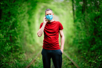masked man outdoors after quarantine