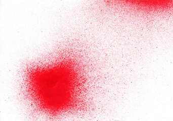 Red paint splashes on a white background. Acrylic paint from a barrel. Drops and ink drips