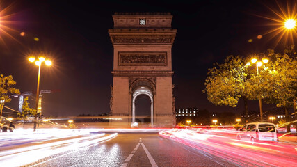 Long exposurein the night  at Champs-Elysees and Arc de Triomphe at night in Paris, France