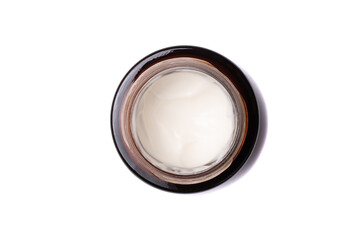 Cream in a jar isolated on white background. Top view.