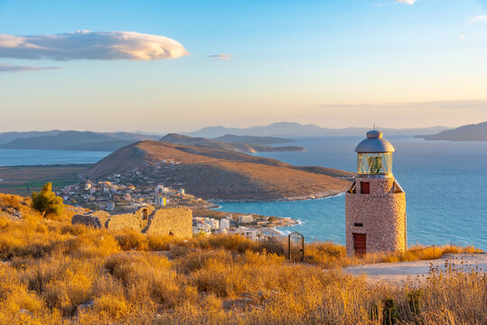 Ragged coastline of Sarande viewed behind a lighthouse, Albania