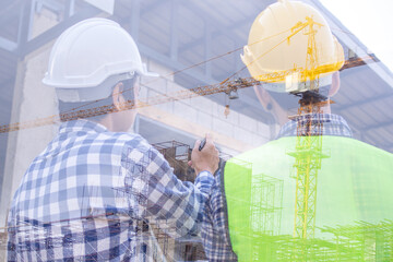 Engineers and contractors talk to the construction site or high-rise building. Construction of condos and large buildings negotiating the cost and benefits of the project together.