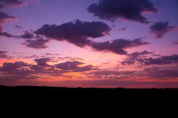 Beautiful dark orange sky evening beauty and Clouds at sunset , Panoramic scene view . Natural background 