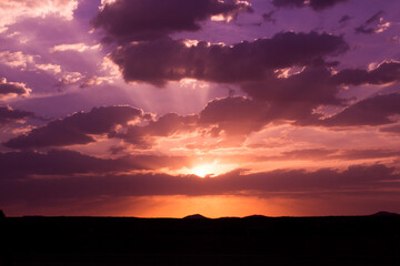 Beautiful dark orange sky evening beauty and Clouds at sunset , Panoramic scene view . Natural background 