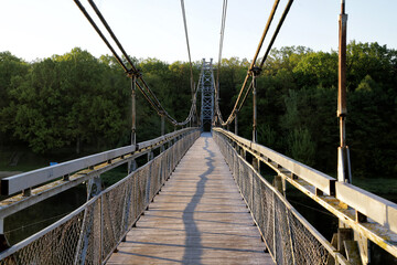 Fototapeta na wymiar Suspension bridge over the Neman river in the city of Bridges, Belarus