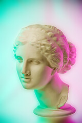 Statue of Venus de Milo. Creative concept colorful neon image with ancient greek sculpture Venus or...