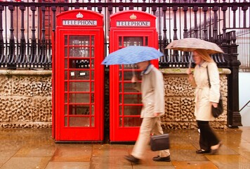 Obraz na płótnie Canvas London telephone booths. Filtered colors style.