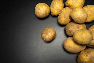 Potatoes on a black background