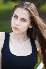 Young woman in summer park