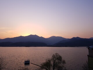 sunset over mountain. sunset over river