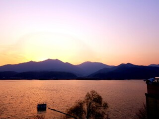 sunset over mountain. sunset over river