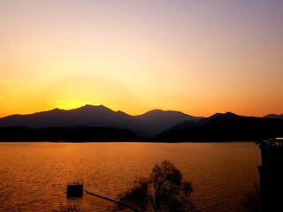 sunset over mountain. sunset over river