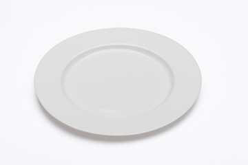 White plate isolated on white background. Clipping path.