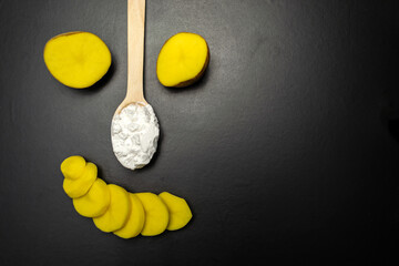 Potatoes on a black background
