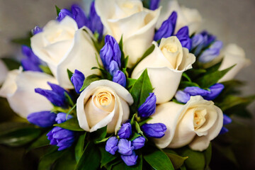 Wedding bouquet white roses & blue hyacinth flowers. Delicate white gentle roses, little blue flowers wedding bouquet. Beautiful wedding bouquet white roses, blue hyacinth. Bridal flowers decoration