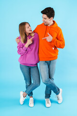 Portrait of a young couple wearing hoodies