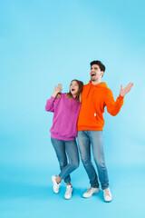 Portrait of a young couple wearing hoodies