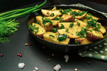 Potatoes on a black background