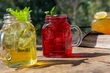 natural juices in the decorative mug and beautiful scenery with good friends