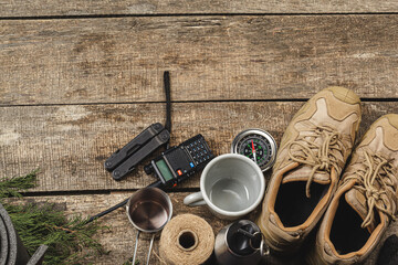 Equipment set for traveler including hiking boots and walki-talkie