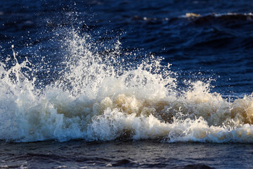 Shore seaside view of wave splash.