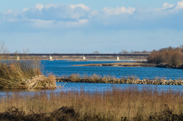 The Po river in autumn towards its delta mouth in the province of Rovigo, Italy
