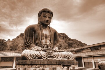 Fototapeta premium Great Buddha in Kamakura. Sepia toned vintage filter photo.