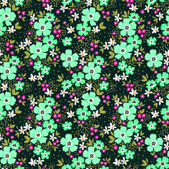 Fototapeta na wymiar Seamless floral pattern for design. Small light blue flowers. Dark blue background. Modern floral texture. A allover floral design in bright colors. The elegant the template for fashion prints.