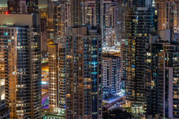 Fototapeta na wymiar Dubai Marina modern cityscape at night. Concrete jungle