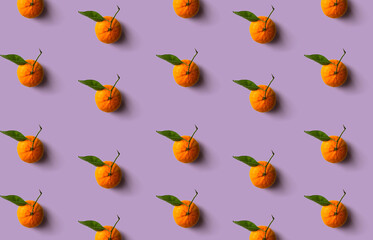 Fototapeta premium Mandarin pattern isolated on soft pastel background. Fresh fruit.