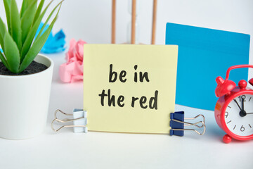 be in the red - english money idiom hand lettering