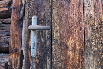 Door handle on Log cabin in Nizna Boca village and municipality in Liptovsky Mikulas district, central Slovakia