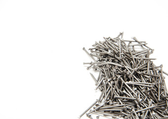 Nail. A pile of nails on a white background in macro. for text. Construction nails