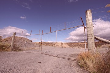Steel gate. Vintage filter toned color image.