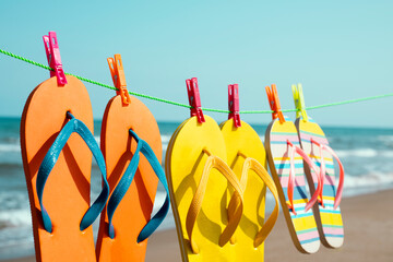 flip-flops hanging on a clothes line
