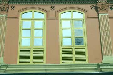 Singapore colonial architecture. Vintage filter toned color image.