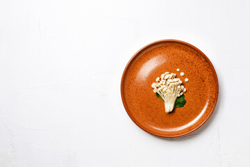 Fototapeta premium Enoki, Enokitake, Flammulina velutipes, edible mushroom popular in Japanese cuisine