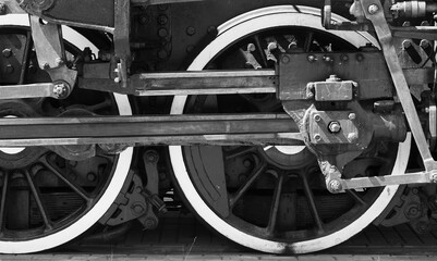 Wheels of a steam locomotive with power parts